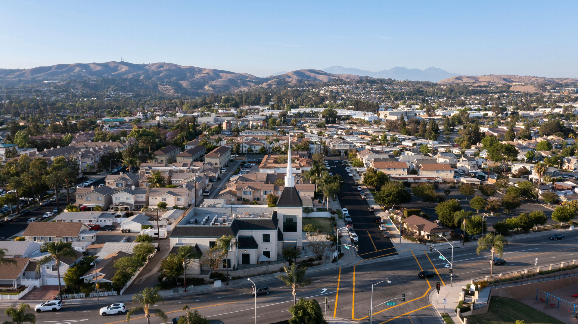 Mediterranean-style Brea, California foothill homes with rolling hills at golden hour